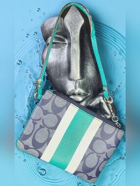 Coach Corner Zip Wristlet In Signature Canvas With A Navy & Teal Varsity Strip